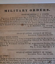 A view of a section of the 1865 Juneteenth General Order No. 3 that is displayed by the Dallas Historical Society at the Fair Park Hall of State in Dallas.