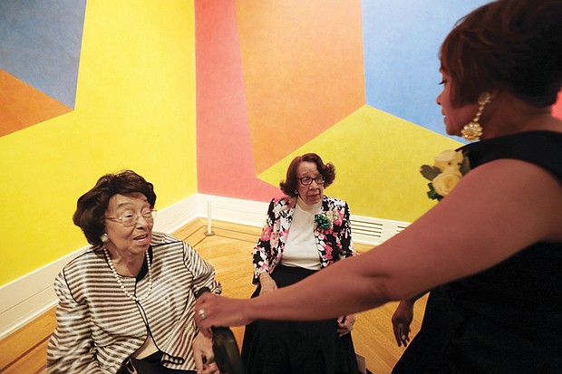Jill Bussey Harris, right, of the Richmond Chapter of The Links, Incorporated, greets Lucille M. Brown, left, and honorary chair Barbara Grey at the Virginia Museum of Fine Arts March 25, 2017.