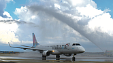 BermudAir’s inaugural flight to Bermuda receives a water cannon salute at Richmond International Airport, marking the return of international passenger service after a long absence.