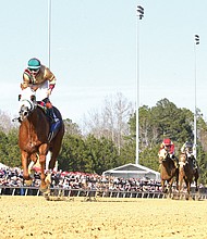 American Promise, a 3-year-old colt trained by D. Wayne Lukas and ridden by jockey Nik Juarez, captures the 2025 Virginia Derby at Colonial Downs with a record-setting time of 1:46.41 for the 1 1/8-mile race.