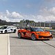 Front 3/4 view of Blade Silver Corvette ZR1X and Sebring Orange Tintcoat Corvette ZR1X Convertible with ZTK Performance Package. Preproduction model shown, actual production model may vary.