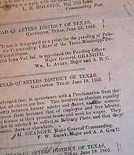 A view of a section of the 1865 Juneteenth General Order No. 3 that is displayed by the Dallas Historical Society at the Fair Park Hall of State in Dallas, Friday, June 6, 2025.
Mandatory Credit:	LM Otero/AP via CNN Newsource