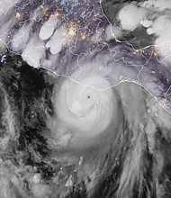 Category 4 Hurricane Erick approaches Mexico late Wednesday night.
Mandatory Credit:	CIRA/RAMMB/NOAA via CNN Newsource
