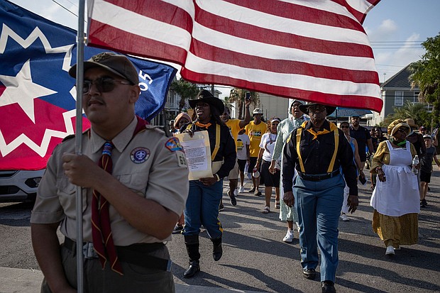 A march reenactment celebrates Juneteenth in Galveston, Texas, in 2023. The day has held significance for Black Americans long before it became a federal holiday in 2021.
Mandatory Credit:	Adrees Latif/Reuters via CNN Newsource