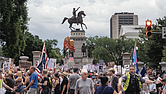 Thousands marched June 14 from Capitol Square to Kanawha Plaza to protest the Trump administration’s policies.