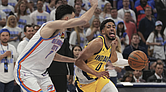 Indiana Pacers guard Tyrese Haliburton (0) drives past Oklahoma City Thunder forward Chet Holmgren (7) during the second half of Game 5 of the NBA Finals basketball series, Monday, June 16, 2025, in Oklahoma City.