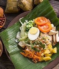 This sweet-salty-sour salad features vegetables dressed in a peanut sauce.
Mandatory Credit:	ferlistockphoto/iStockphoto/Getty Images via CNN Newsource