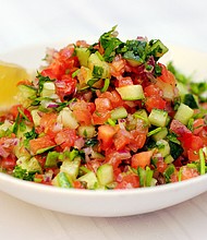 This Israeli salad features fresh tomatoes and cucumbers, grown year-round in Israel.
Mandatory Credit:	Noam Galai/Moment Open/Getty Images via CNN Newsource