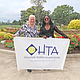 Houston Tennis Association Executive Director Emily Schaefer, left, and scholarship recipient Anaiah Smith, right