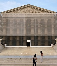 The Supreme Court on June 23 granted President Donald Trump’s emergency request to resume deporting migrants to countries other than their homeland. People take photos at the US Supreme Court at dusk on June 10 in Washington, DC.
Mandatory Credit:	Kevin Carter/Getty Images via CNN Newsource