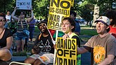 Demonstrators gathered at Monroe Park for a rally Wednesday, June 18, organized by the Party for Socialism and Liberation, Virginia, to oppose U.S. involvement in aggression against Iran and to protest ongoing violence in Palestine.