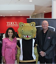 Pictured (L to R): HTX Soccer Director of Operations Simon Boddison,TDECU SVP Marketing & Brand Laura Whitley, HTX Soccer mascot HT-Rex,TDECU Chief Growth Officer Josh Brian, and HTX Soccer Director of Communications & Events Stuart Taylor