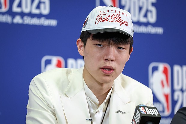 Yang Hansen speaks to the media after being drafted 16th oveall by the Memphis Grizzlies then traded to the Portland Trail Blazers during the 2025 NBA Draft.
Mandatory Credit:	Mike Lawrie/Getty Images via CNN Newsource