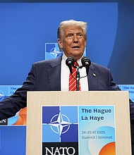 President Donald Trump speaks during a media conference at the end of the NATO summit as Secretary of State Marco Rubio, right, and Defense Secretary Pete Hegseth listen, in The Hague, Netherlands on June 25.
Mandatory Credit:	Alex Brandon/AP via CNN Newsource