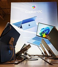 Microsoft Copilot + PC signage inside a Best Buy store on Black Friday is pictured in Pinole, California on Friday, Nov. 29, 2024. Microsoft is laying off thousands of employees, its third round of cuts in recent months, the company confirmed on July 2.
Mandatory Credit:	David Paul Morris/Bloomberg/Getty Images via CNN Newsource