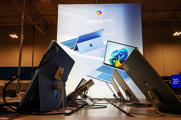 Microsoft Copilot + PC signage inside a Best Buy store on Black Friday is pictured in Pinole, California on Friday, Nov. 29, 2024. Microsoft is laying off thousands of employees, its third round of cuts in recent months, the company confirmed on July 2.
Mandatory Credit:	David Paul Morris/Bloomberg/Getty Images via CNN Newsource