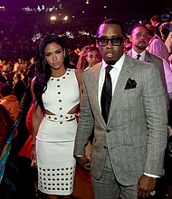 Model Cassie Ventura and Sean "Diddy" Combs pose ringside at a Las Vegas boxing match in 2015.
Mandatory Credit:	Ethan Miller/Getty Images via CNN Newsource