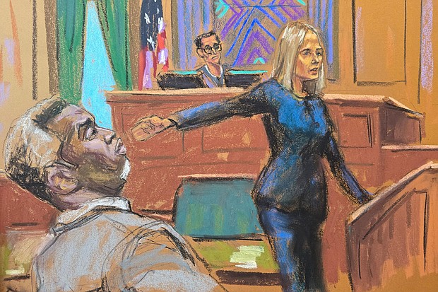 Prosecutor Emily Johnson points to Sean "Diddy" Combs in front of US District Judge Arun Subramanian at Combs' trial in New York City in this courtroom sketch.
Mandatory Credit:	Jane Rosenberg/Reuters via CNN Newsource