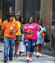 The “RPS Five” — bus drivers fired April 25 following coordinated absences — leave City Hall to cheers after a press conference announcing their reinstatement under a new three-year collective bargaining agreement between Richmond Public Schools and LIUNA Local 804. The
drivers return with six-hour shifts at full pay.