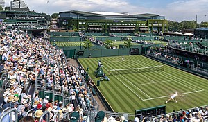 Spectators pack out the stands at Wimbledon, where for the first time there are no line judges.
Mandatory Credit:	Tim Clayton/Corbis Sport/Getty Images via CNN Newsource
