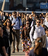 Commuters cross London Bridge in London on Wednesday, June 2.
Mandatory Credit:	Jason Alden/Bloomberg/Getty Images via CNN Newsource