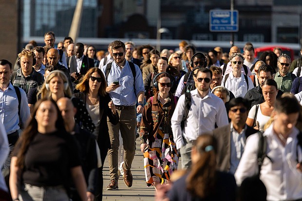Commuters cross London Bridge in London on Wednesday, June 2.
Mandatory Credit:	Jason Alden/Bloomberg/Getty Images via CNN Newsource