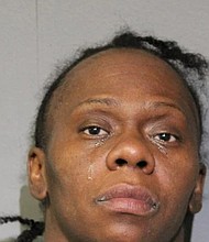 Chicago police said Wendy Tolbert, 45, stabbed her three children, one fatally, before setting their Logan Square home on fire.
Mandatory Credit:	WBBM via CNN Newsource