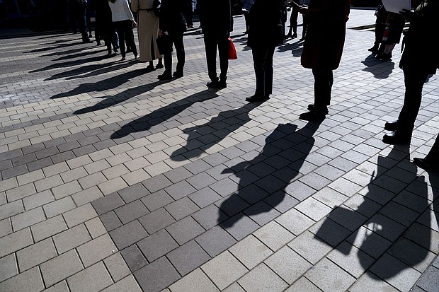 Job seekers wait in line to enter a job fair event in Silver Spring, Maryland, on April 16.
Mandatory Credit:	Roberto Schmidt/AFP/Getty Images via CNN Newsource