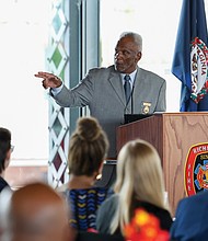 Charles W. Ellis, retired firefighter, gives a presentation on the history of Black firefighters in Virginia during the event.