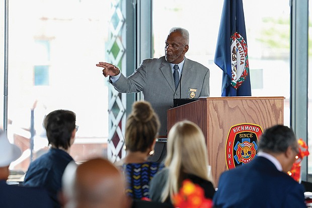 Charles W. Ellis, retired firefighter, gives a presentation on the history of Black firefighters in Virginia during the event.