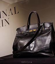The original Birkin on display in New York in June ahead of the auction sale.
Mandatory Credit:	Brendan McDermid/Reuters via CNN Newsource