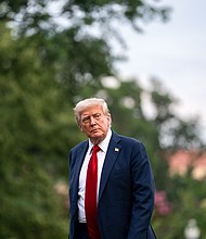 US President Donald Trump walks on the South Lawn of the White House after arriving on Marine One in Washington, DC, US, on Sunday, July 13.
Mandatory Credit:	Bonnie Cash/UPI/Bloomberg/Getty Images via CNN Newsource