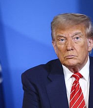 US President Donald Trump looks on next to NATO Secretary General Mark Rutte (not pictured) at the NATO summit of heads of state and government in The Hague on June 25.
Mandatory Credit:	Piroschka Van De Wouw/Pool/AFP/Getty Images via CNN Newsource