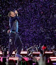 Chris Martin never said it was easy. Just ask the two people he blasted into an internet mess
Mandatory Credit:	Ethan Miller/Getty Images via CNN Newsource