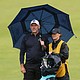 Lee Westwood interacts with his wife and caddie Helen Storey on the 18th green during day one of The 153rd Open Championship at Royal Portrush.
Mandatory Credit:	Andrew Redington/Getty Images via CNN Newsource
