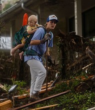 A search and rescue worker looks through debris for survivors or victims swept up in the flash flooding in Hunt, Texas, on July 6.
Mandatory Credit:	Jim Vondruska/Getty Images via CNN Newsource