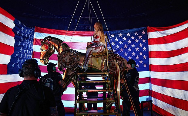 Beyoncé on stage at Mercedes-Benz Stadium in Atlanta, flanked by the American flag.
Mandatory Credit:	Julian Dakdouk/PictureGroup//Shutterstock via CNN Newsource