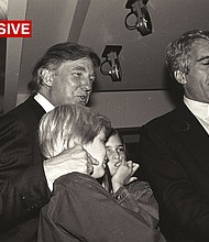 Donald Trump and his kids, Eric and Ivanka Trump, are seen with Jeffrey Epstein at the Harley Davidson Cafe opening in New York in 1993.
Mandatory Credit:	Dafydd Jones via CNN Newsource