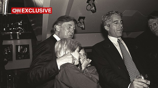 Donald Trump and his kids, Eric and Ivanka Trump, are seen with Jeffrey Epstein at the Harley Davidson Cafe opening in New York in 1993.
Mandatory Credit:	Dafydd Jones via CNN Newsource