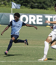 Saint Louis Scott Gallagher (blue) took on Crossfire Academy (white) of Seattle, falling 4-0.