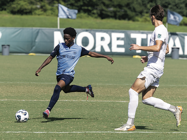 Saint Louis Scott Gallagher (blue) took on Crossfire Academy (white) of Seattle, falling 4-0.