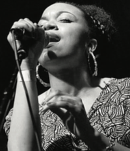 Vocalist Sam Reed