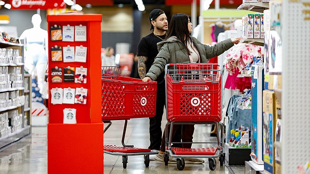Shoppers look for bargains at a Target in Chicago. The retail is ending its "price match" policy later this month.
Mandatory Credit:	Kamil Krzaczynski/AFP via Getty Images via CNN Newsource