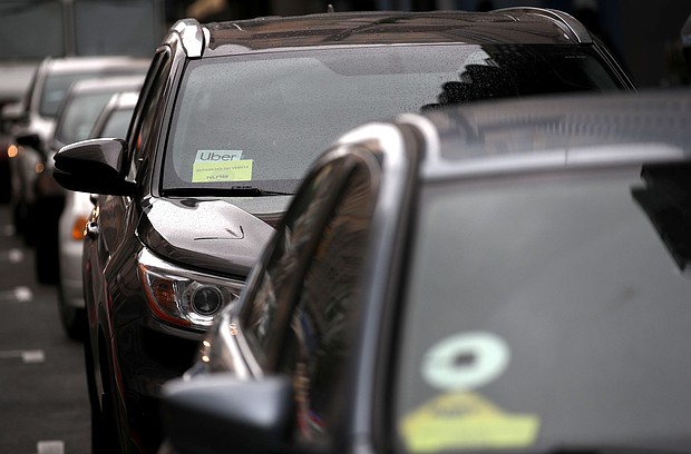 The Uber logo is displayed on a car on March 22, 2019 in San Francisco, California. Uber is piloting a new option for its US app that will allow female passengers to request women drivers, coming after the company has long grappled with preventing sexual assault on its platform.
Mandatory Credit:	Justin Sullivan/Getty Images via CNN Newsource