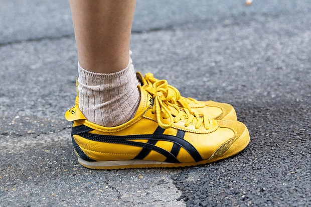 Slim-line styles like the Onitsuka Tiger were once worn exclusively on the race track. Now they're a common sight on the streets.
Mandatory Credit:	Valentina Frugiuele/Getty Images via CNN Newsource