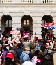 A pro-Trump mob floods into the Capitol Building after breaking into it on January 6, 2021 in Washington, DC.
Mandatory Credit:	Jon Cherry/Getty Images via CNN Newsource