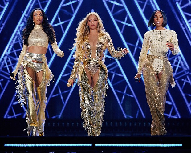 (From left) Michelle Williams, Beyoncé and Kelly Rowland during Beyoncé's Cowboy Carter concert in Las Vegas on Saturday, July 26.
Mandatory Credit:	Raven Varona/PictureGroup/Shutterstock via CNN Newsource