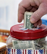 Making cash donations to public charities helps others while also reducing your federal income tax bill. But the new tax law limits how much itemizers may deduct in a given year and expands the amount non-itemizers may claim.
Mandatory Credit:	Amber Arnold/Wisconsin State Journal/AP via CNN Newsource