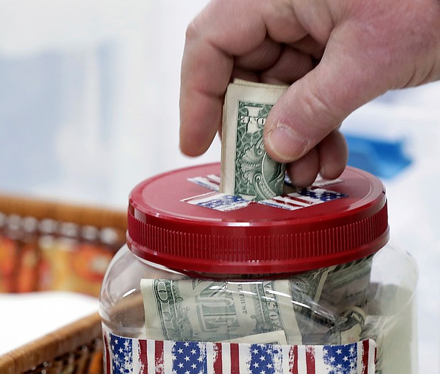 Making cash donations to public charities helps others while also reducing your federal income tax bill. But the new tax law limits how much itemizers may deduct in a given year and expands the amount non-itemizers may claim.
Mandatory Credit:	Amber Arnold/Wisconsin State Journal/AP via CNN Newsource
