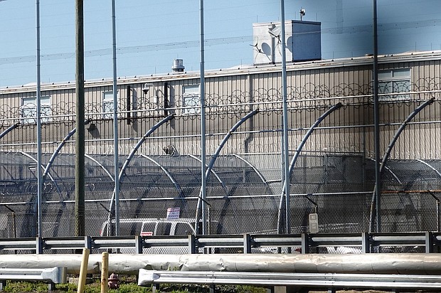 Seen here is the security fencing at Delaney Hall, a 1,000-person detention center operated by private prison company GEO Group for Immigration and Customs Enforcement (ICE), in Newark, New Jersey, on May 10.
Mandatory Credit:	Bing Guan/Reuters via CNN Newsource